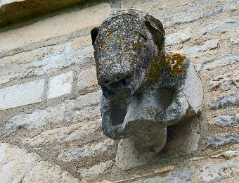 Pierre de réemploi - Animal  surmontant une tête humaine