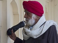 Visiteur photographié dans le city palace d'Udaipur